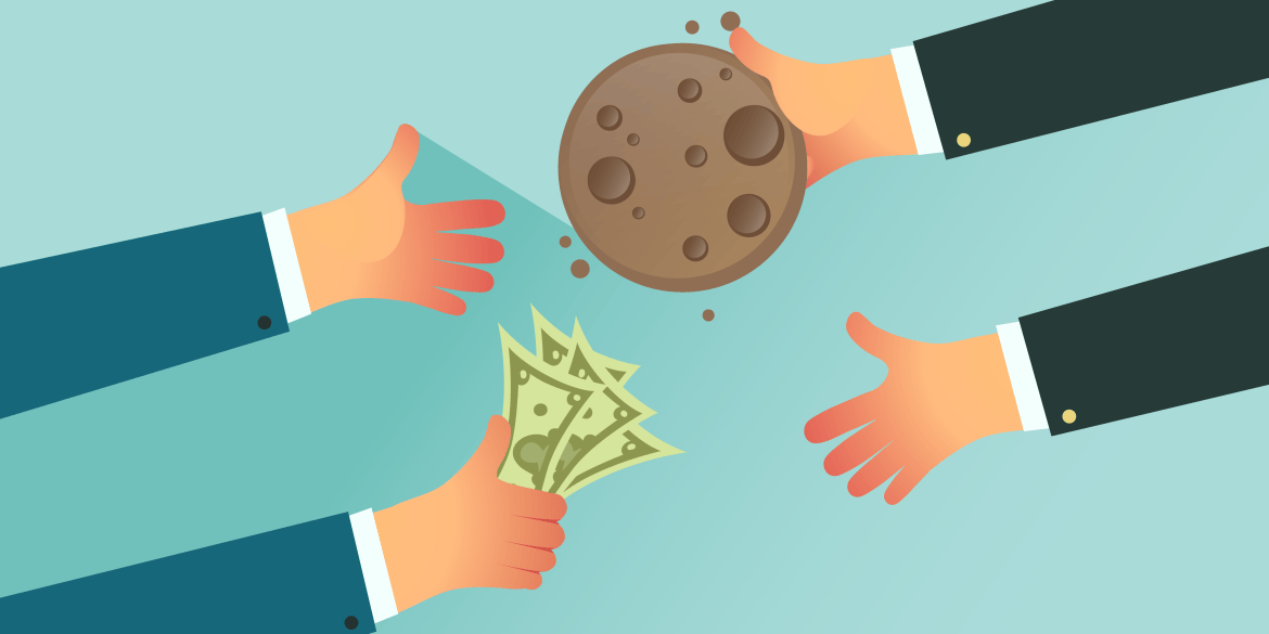 Two people exchaning a cookie for money